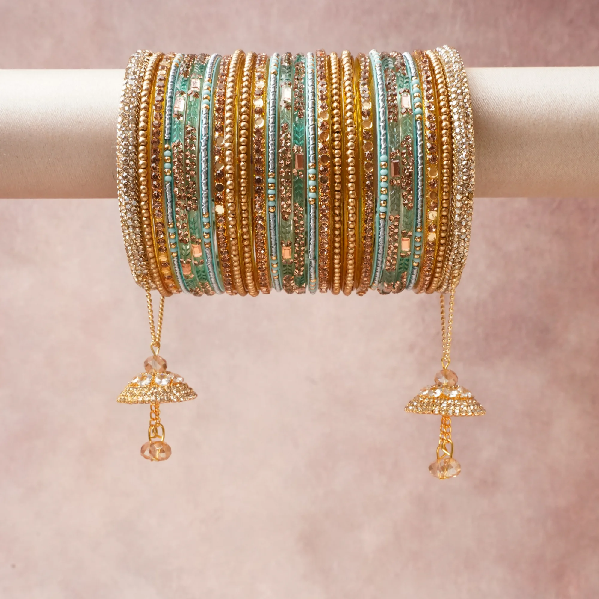 A commanding Gold anchors this beautiful set, enriched with accents of Teal, Dark Green, Champagne, Clear Crystal, Peach that add depth and dimension.

Featuring a striking composition of Gold-Toned Metal, Glass, Rhinestones, Mirror, this set carries intricate craftsmanship and strong presence. Grand in form, it is created for moments that deserve to be marked.